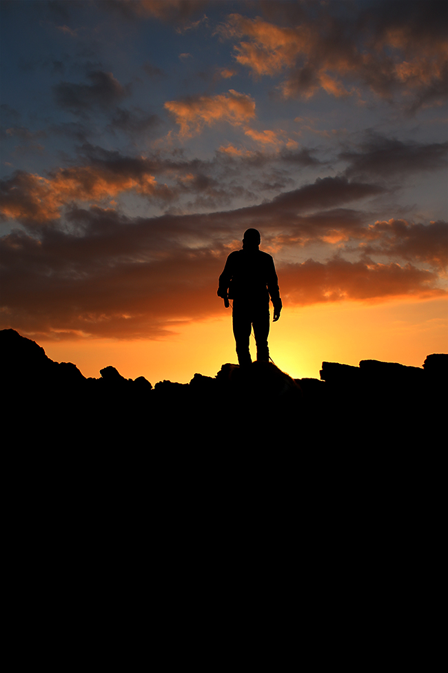 Cemlyn Bay, Anglesey, Wales - sunset man in sillouette